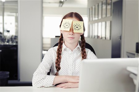 preteen eyes - Girl in office with adhesive notes covering eyes Stock Photo - Premium Royalty-Free, Code: 649-07119763