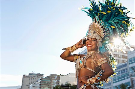 parade - Samba dancer using cellphone, Ipanema Beach, Rio De Janeiro, Brazil Stockbilder - Premium RF Lizenzfrei, Bildnummer: 649-07119860