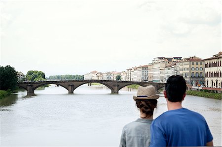 female travel photo - Couple looking at Ponte alle Grazie, Florence, Tuscany, Italy Stock Photo - Premium Royalty-Free, Code: 649-07238570