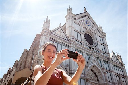 simsearch:649-07238579,k - Woman outside Santa Croce church, Piazza di Santa Croce, Florence, Tuscany, Italy Stock Photo - Premium Royalty-Free, Code: 649-07238585