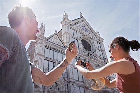 Man and woman photogrpahing Church of Santa Croce, Piazza di Santa Croce, Florence, Tuscany, Italy Stock Photo - Premium Royalty-Free, Code: 649-07238586