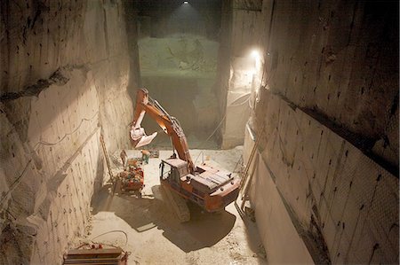 Excavator in a marble quarry Fotografie stock - Premium Royalty-Free, Codice: 649-07238755