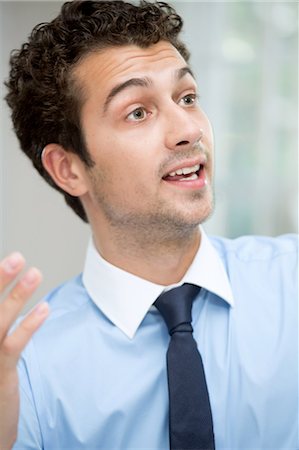 enthusiastic business man - Young man talking Stock Photo - Premium Royalty-Free, Code: 649-07238898