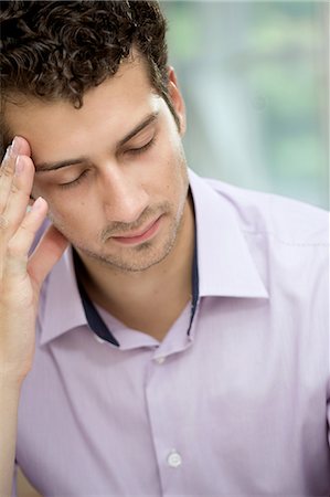 simsearch:649-07238907,k - Young man in deep thoughts Stock Photo - Premium Royalty-Free, Code: 649-07238914