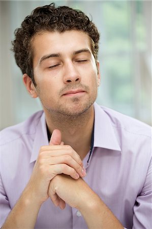 Young man in deep thoughts Stock Photo - Premium Royalty-Free, Code: 649-07238913