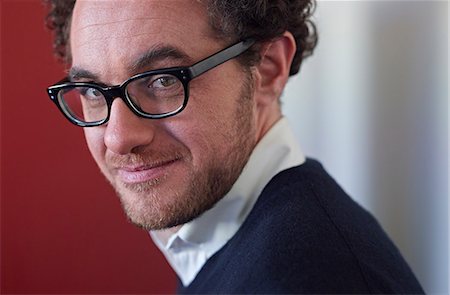 eyeglasses closeup - Portrait of businessman wearing glasses Stock Photo - Premium Royalty-Free, Code: 649-07239287