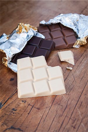 Still life with white, dark and milk chocolate Stock Photo - Premium Royalty-Free, Code: 649-07239310