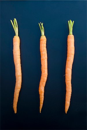 Three carrots, still life Photographie de stock - Premium Libres de Droits, Code: 649-07239337