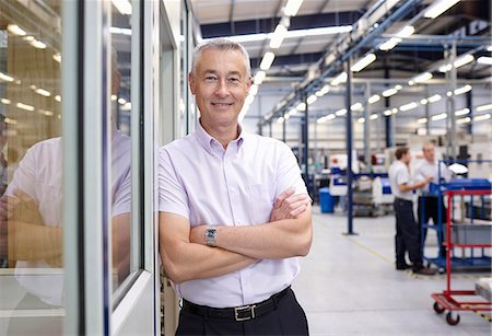 engineer efficiency - Portrait of manager with arms folded in engineering factory Stock Photo - Premium Royalty-Free, Code: 649-07239358