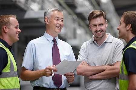 Warehouse workers and manager in engineering warehouse Photographie de stock - Premium Libres de Droits, Code: 649-07239379