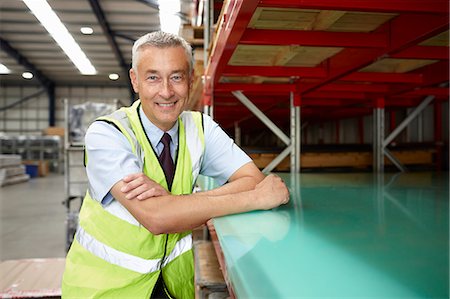 simsearch:649-07239381,k - Portrait of warehouse manager in engineering warehouse Foto de stock - Sin royalties Premium, Código: 649-07239393