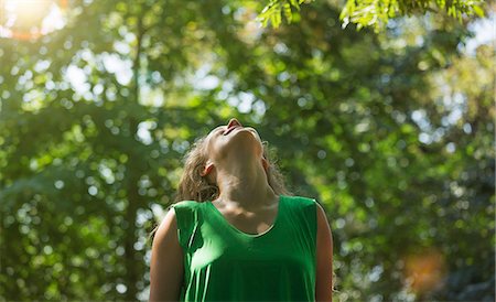 Teenage girl wearing green top looking up, Prague, Czech Republic Stockbilder - Premium RF Lizenzfrei, Bildnummer: 649-07239628