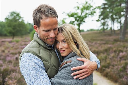 people embracing - Mid adult couple hugging Stock Photo - Premium Royalty-Free, Code: 649-07239730