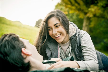 simsearch:649-07521104,k - Young couple in park, laughing Stock Photo - Premium Royalty-Free, Code: 649-07279679