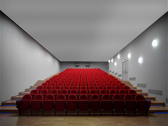 Red chairs in empty auditorium Foto de stock - Sin royalties Premium, Código de la imagen: 649-07279684