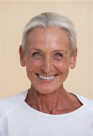 simsearch:649-07064439,k - Studio portrait of senior woman smiling Stock Photo - Premium Royalty-Free, Code: 649-07279750
