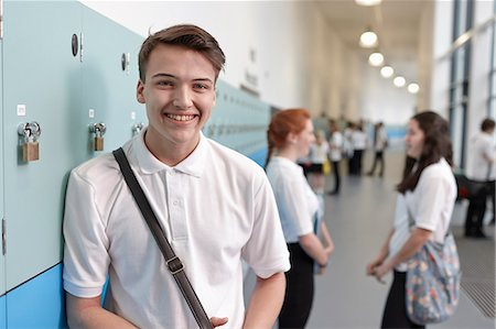 school hallway - Portrait of teenage schoolboy in corridor Stock Photo - Premium Royalty-Free, Code: 649-07280046