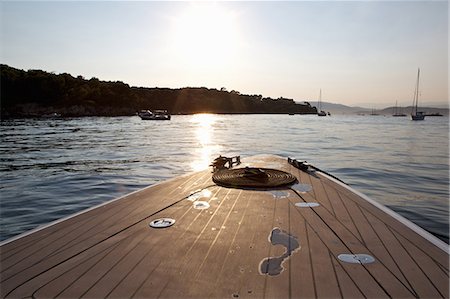 french riviera travel - Footprint on bow of boat, Cannes Islands, Cote D'Azur, France Stock Photo - Premium Royalty-Free, Code: 649-07280252