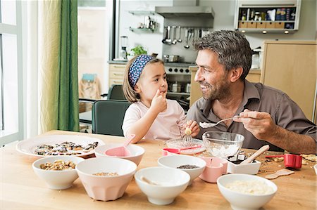 family fun indoors children not portrait - Father and daughter baking in kitchen Stock Photo - Premium Royalty-Free, Code: 649-07280370