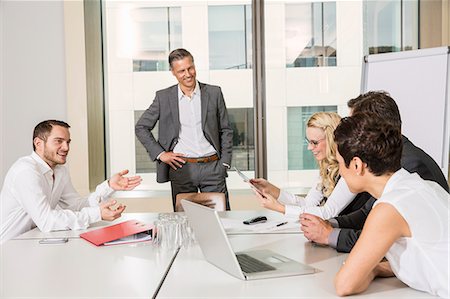 Businesspeople meeting in conference room Stock Photo - Premium Royalty-Free, Code: 649-07280463