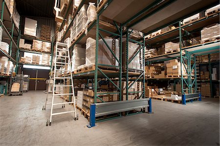 Shelves of stock and orders in printing warehouse Stock Photo - Premium Royalty-Free, Code: 649-07280534