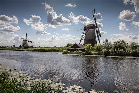 Windmills and canal, Kinderdijk, Netherlands Foto de stock - Sin royalties Premium, Código: 649-07280595