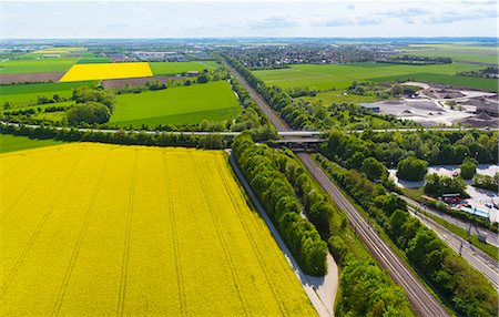deutschland - View of roads and oil seed rape fields, Munich, Bavaria, Germany Stockbilder - Premium RF Lizenzfrei, Bildnummer: 649-07280985