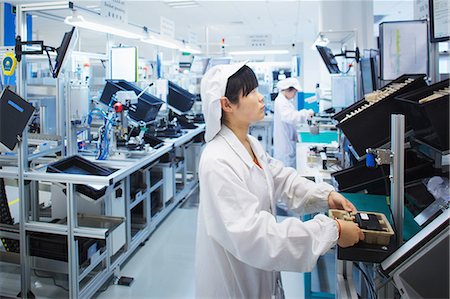 Worker at small parts manufacturing factory in China Stockbilder - Premium RF Lizenzfrei, Bildnummer: 649-07436356