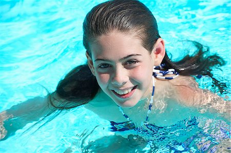 swimming children - Girl in swimming pool Stock Photo - Premium Royalty-Free, Code: 649-07436494