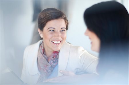 Businesswomen having conversation Stock Photo - Premium Royalty-Free, Code: 649-07436529