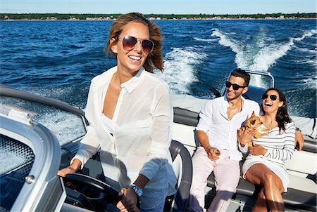 sun glasses summer - Young adults on boat, Gavle, Sweden Photographie de stock - Premium Libres de Droits, Code: 649-07437167