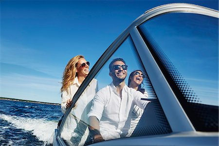 steer - Young adults on boat, Gavle, Sweden Photographie de stock - Premium Libres de Droits, Code: 649-07437182