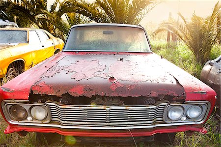 salvage yard classics cars - Front view of vintage car in scrap yard Stock Photo - Premium Royalty-Free, Code: 649-07437397