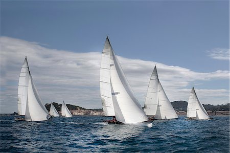 fleet - Fleet of classic sailing yachts Foto de stock - Sin royalties Premium, Código: 649-07437512