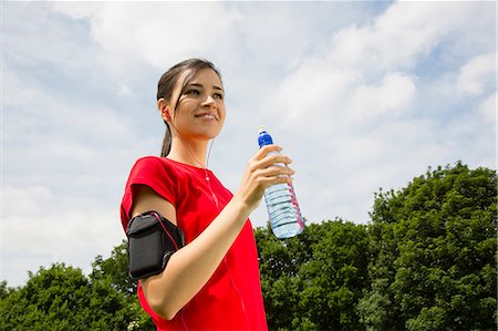 determined female jogger - Jogger having drink of water Stock Photo - Premium Royalty-Free, Code: 649-07438056