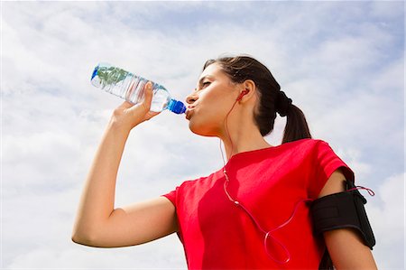 determined female jogger - Jogger having drink of water Stock Photo - Premium Royalty-Free, Code: 649-07438057