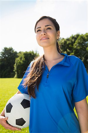 esfuerzo - Woman holding soccer ball Foto de stock - Sin royalties Premium, Código: 649-07438074