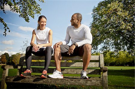 sitting on park bench - Couple chatting on park bench Stock Photo - Premium Royalty-Free, Code: 649-07520084