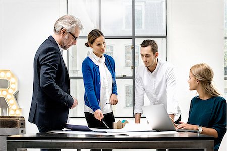 four people woman man - Business people in meeting at office Stock Photo - Premium Royalty-Free, Code: 649-07520117