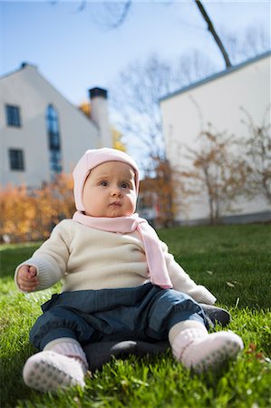 simsearch:649-07064496,k - Baby sitting on grass Stock Photo - Premium Royalty-Free, Code: 649-07520182