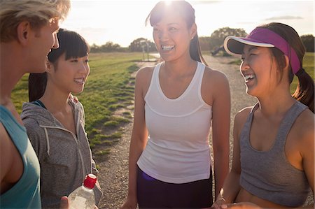 runners man - Personal trainer chatting with group of clients Stock Photo - Premium Royalty-Free, Code: 649-07520233