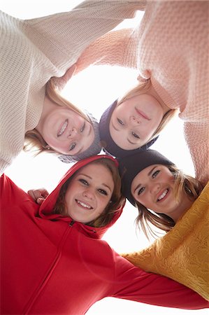 simsearch:649-07520257,k - Portrait of four teenage girls head to head Photographie de stock - Premium Libres de Droits, Code: 649-07520266