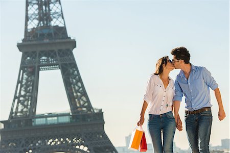 Young couple kissing near Eiffel Tower, Paris, France Stock Photo - Premium Royalty-Free, Code: 649-07520327