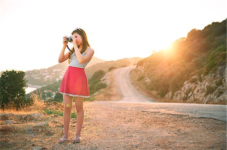 Girl taking photographs at sunset, Kas, Turkey Stockbilder - Premium RF Lizenzfrei, Bildnummer: 649-07520778