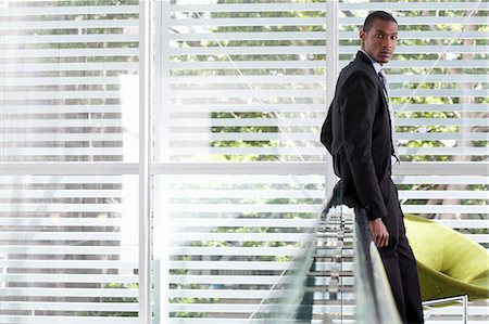 Portrait of mid adult businessman on office balcony Stockbilder - Premium RF Lizenzfrei, Bildnummer: 649-07520809