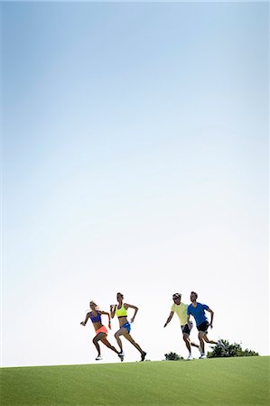 sports park - Group of adult runners running in park Stock Photo - Premium Royalty-Free, Code: 649-07520934