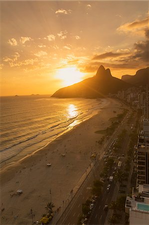 sun flare gold - View of Ipanema beach at sunset,  Rio De Janeiro, Brazil Stock Photo - Premium Royalty-Free, Code: 649-07521155