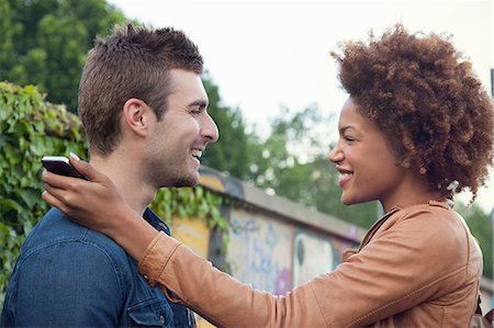 Young couple chatting face to face Stock Photo - Premium Royalty-Free, Code: 649-07560149