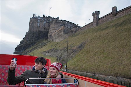 people uk - A young couple on an open-top bus tour of Edinburgh Scotland Stock Photo - Premium Royalty-Free, Code: 649-07560531