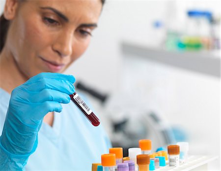 diagnosis - Scientist viewing various human samples for testing in the laboratory Stock Photo - Premium Royalty-Free, Code: 649-07585099